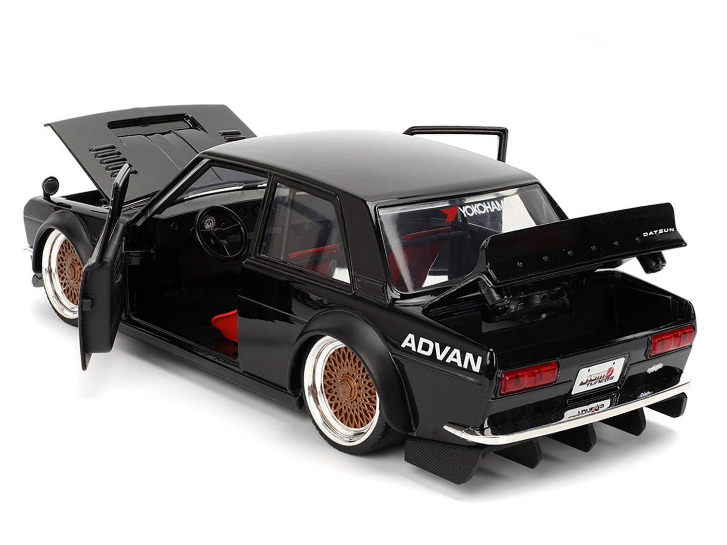 1973 Datsun 510 Black with Gold Wheels "JDM Tuners" Series 1/24 Diecast Model Car by Jada