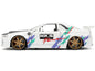 2002 Nissan Skyline GT-R (R34) RHD (Right Hand Drive) "HKS Power" White with Carbon Hood and Graphics "JDM Tuners" Series 1/24 Diecast Model Car by Jada